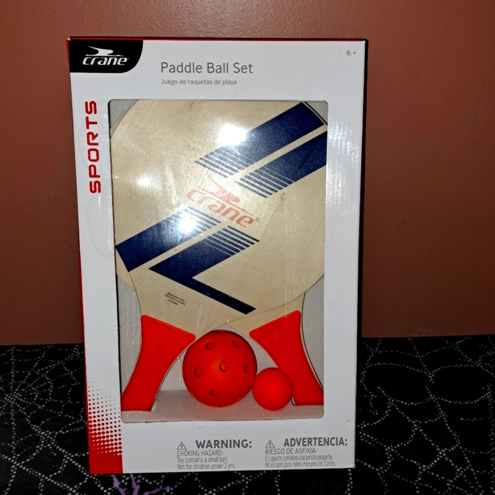 Crane Paddle Ball Set with Orange and Blue Accents